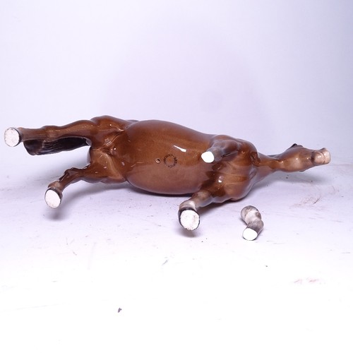 233 - 2 Beswick porcelain horse figures, largest length 23cm (2) The Huntsman has a broken front right leg... 