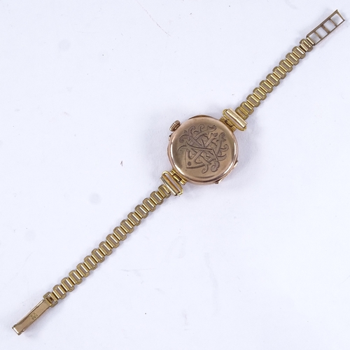 1006 - An early 20th century lady's 9ct rose gold mechanical wristwatch, white enamel dial with Arabic nume... 