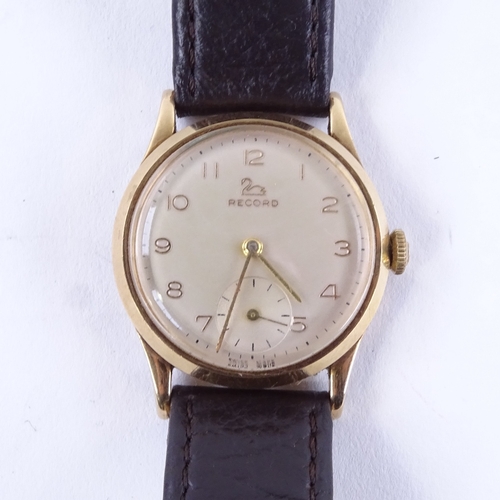 1010 - RECORD - a Vintage 9ct gold mechanical wristwatch, silvered dial with gilt Arabic numerals and subsi... 