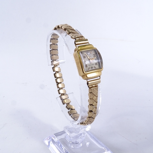 1011 - LIGHT - a lady's Vintage 18ct gold mechanical wristwatch, silvered dial with gilt eighthly Arabic nu... 