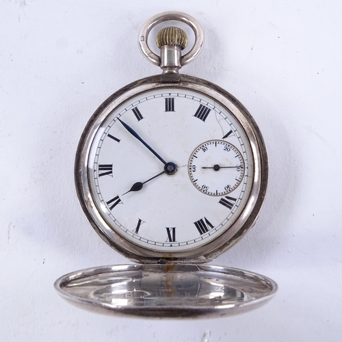 1028 - An early 20th century silver full hunter pocket watch, white enamel dial with black Roman numeral ho... 