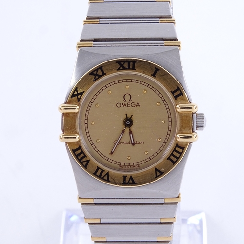 1031 - OMEGA - a lady's Vintage stainless steel and gold Constellation quartz wristwatch, ref. 795.1080.1, ... 