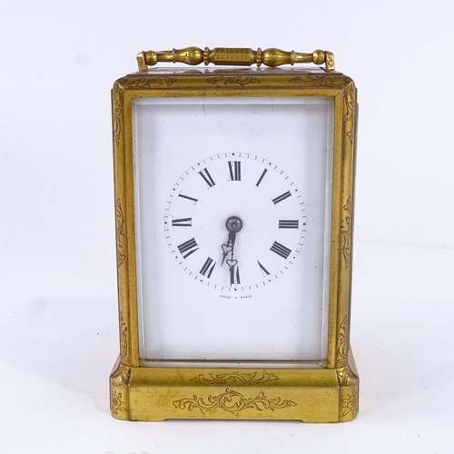 1036 - A 19th century French brass 8-day striking carriage clock, by Jules of Paris, white enamel dial with... 