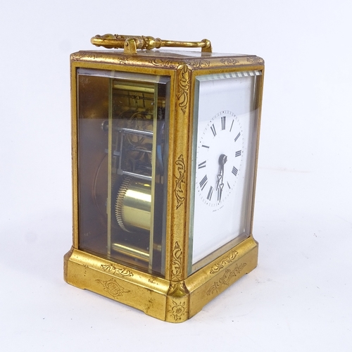 1036 - A 19th century French brass 8-day striking carriage clock, by Jules of Paris, white enamel dial with... 