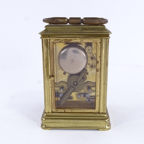 1037 - A 19th century brass 8-day striking repeater carriage clock, white enamel dial with Roman numeral ho... 