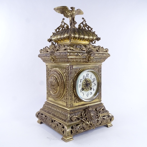 1039 - A large 19th century French brass architectural 8-day mantel clock, cream enamel dial with Arabic nu... 