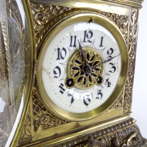 1039 - A large 19th century French brass architectural 8-day mantel clock, cream enamel dial with Arabic nu... 