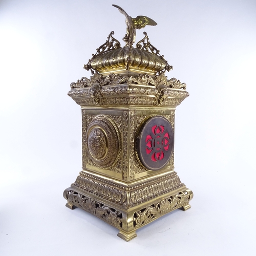 1039 - A large 19th century French brass architectural 8-day mantel clock, cream enamel dial with Arabic nu... 