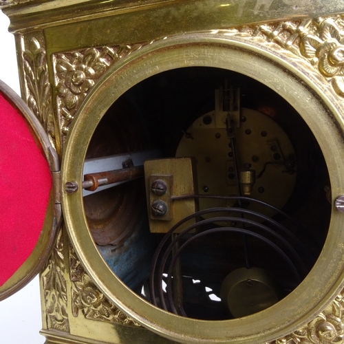 1039 - A large 19th century French brass architectural 8-day mantel clock, cream enamel dial with Arabic nu... 