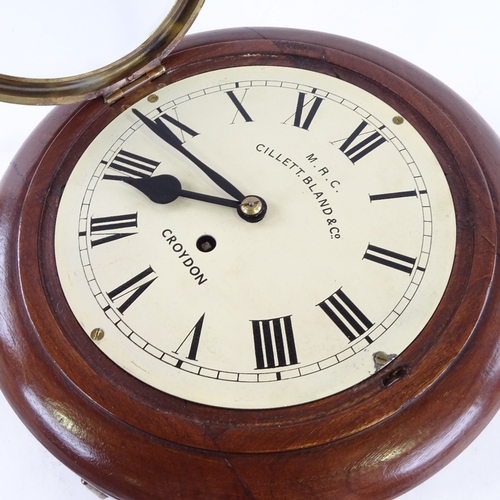 1043 - A mahogany circular dial wall clock, by MRC Cillett, Bland & Co of Croydon, cream dial with Roman nu... 