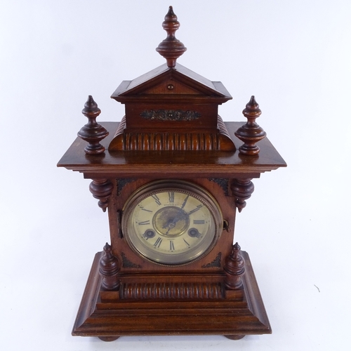 1044 - An early 20th century mahogany-cased 8-day architectural mantel clock, examined by Benet Fink & Co o... 