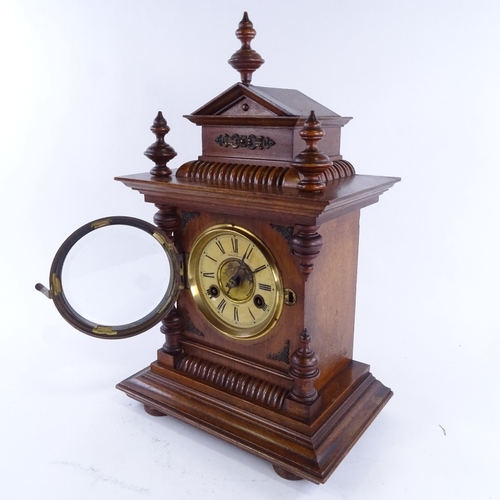 1044 - An early 20th century mahogany-cased 8-day architectural mantel clock, examined by Benet Fink & Co o... 