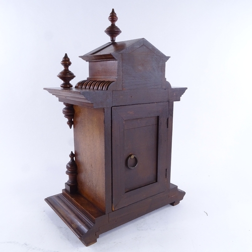 1044 - An early 20th century mahogany-cased 8-day architectural mantel clock, examined by Benet Fink & Co o... 