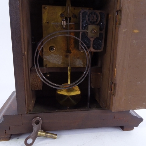 1044 - An early 20th century mahogany-cased 8-day architectural mantel clock, examined by Benet Fink & Co o... 