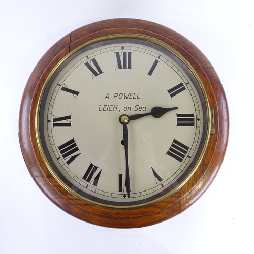 1045 - An early 20th century oak-cased circular dial wall clock, by A Powell of Leich-on-Sea, silvered dial... 