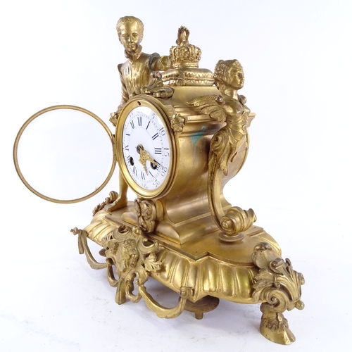 1046 - A 19th century French gilt-bronze 8-day figural mantel clock, surmounted by a Prince with a crown, w... 