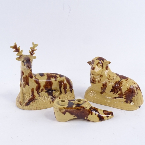 117 - 3 pieces of 19th century Wealden glazed pottery, comprising a stag, length 14cm, sheep, length 14cm,... 