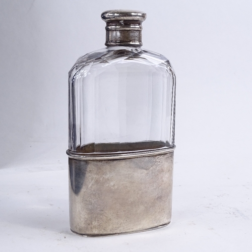 120 - A Victorian silver mounted hip flask, hallmarked Birmingham 1881 maker J.L., height 14cm.