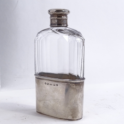 120 - A Victorian silver mounted hip flask, hallmarked Birmingham 1881 maker J.L., height 14cm.