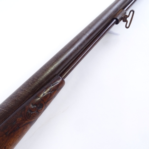 134 - A 19th century double barrelled percussion muzzle loading sporting gun, with carved wood trigger gua... 