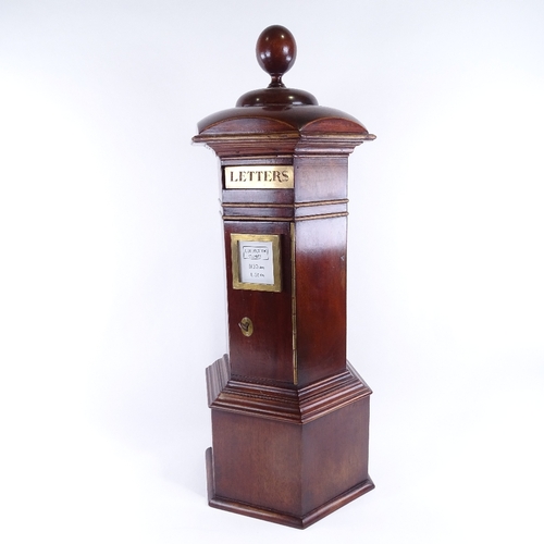 135 - A vintage mahogany country-house post box, with applied mouldings, brass mounts and ball finial, hei... 