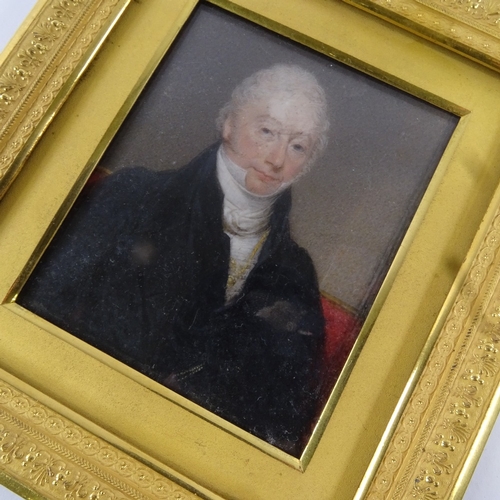 67 - An early 19th century miniature watercolour on ivory, half-length portrait of a gentleman wearing a ... 