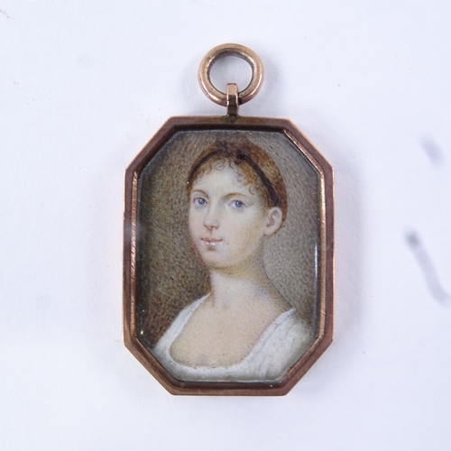 71 - A Georgian miniature watercolour on ivory, portrait of a young lady, unmarked gold pendant frame, fr... 
