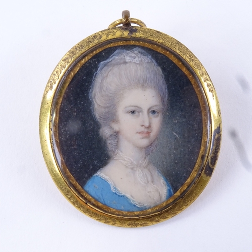 73 - A Georgian miniature watercolour on ivory, head and shoulders portrait of a lady wearing a blue dres... 
