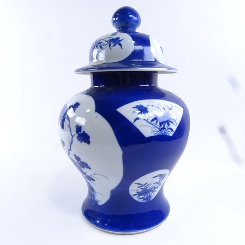 86 - A Chinese blue and white porcelain jar and cover, hand painted bird and prunus decoration, height 32... 