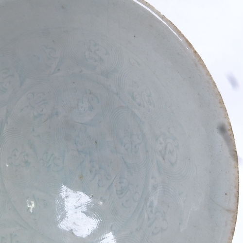 93 - A Chinese celadon glaze porcelain footed bowl, incised decoration, diameter 19cm, in fitted fabric-c... 