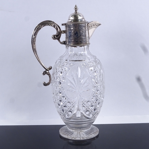95 - An Edwardian cut glass and silver mounted Claret jug, hallmarks Birmingham 1908, height 28cm.