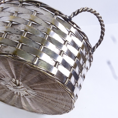 98 - A silver plated basket-weave bread basket with glass liner, early 20th century, basket diameter 24cm... 