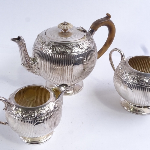 99 - A 19th century electroplate 3-piece tea set of globular form, with carved ivory knop and armorial cr... 