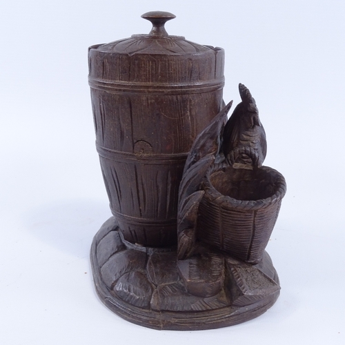 172 - A Black Forest carved and stained wood pot and cover, with a hen figure mount and basket, height 18c... 