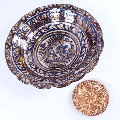 175 - A Hispano-Moresque lustre faience tazza, and another small dish, tazza diameter 27cm.