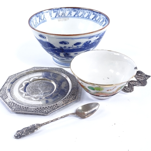 184 - A group of Oriental items, including a porcelain lotus leaf dish with frog mount, length 19cm, a blu... 