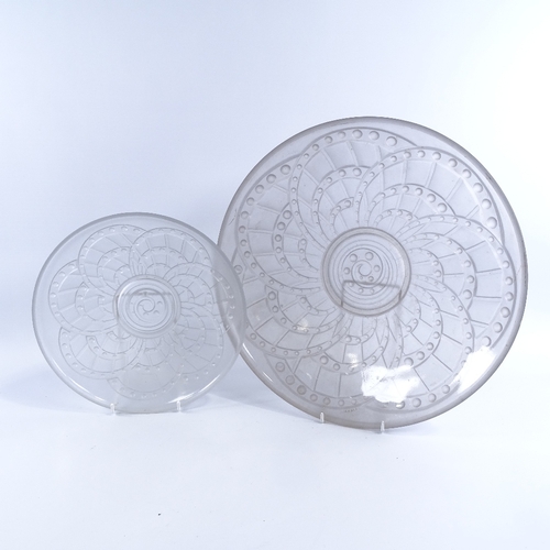 185 - A French moulded frosted glass bowl, stamped J Landier, Cristal De Sevres, diameter 35cm, and a simi... 