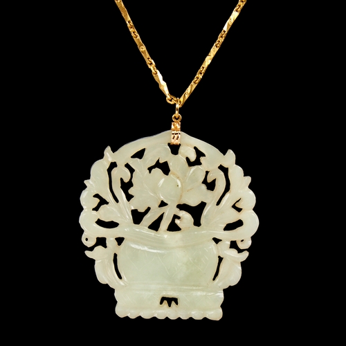 1106 - A Chinese carved and pierced jade basket of flowers pendant necklace, on a Chinese high carat gold f... 