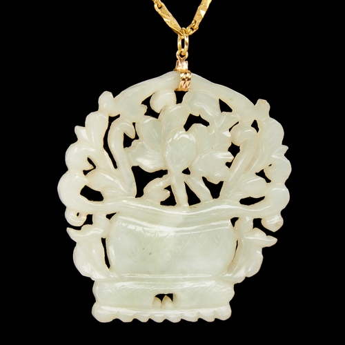 1106 - A Chinese carved and pierced jade basket of flowers pendant necklace, on a Chinese high carat gold f... 