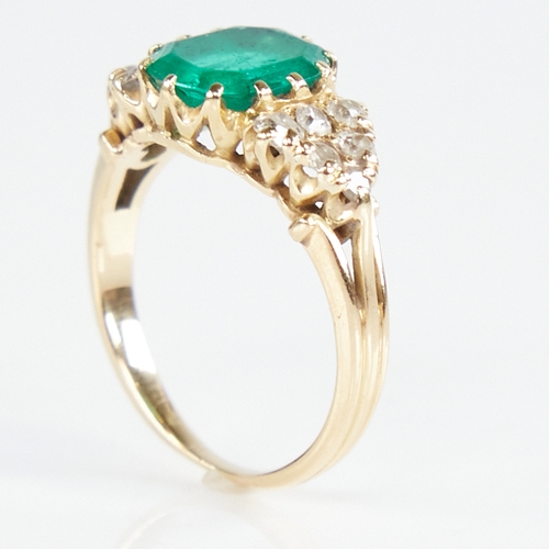 1110 - An early 20th century unmarked gold emerald and diamond cluster ring, set with octagonal step-cut em... 