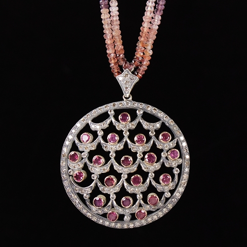 1111 - A Belle Epoque unmarked gold and silver amethyst and diamond cluster pendant necklace, set with swag... 