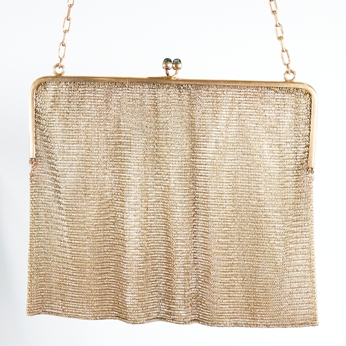 1112 - An Art Deco 9ct gold mesh evening bag/purse, 9ct cable link handle suspending a 9ct frame with caboc... 