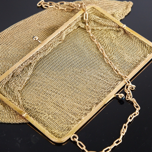 1112 - An Art Deco 9ct gold mesh evening bag/purse, 9ct cable link handle suspending a 9ct frame with caboc... 