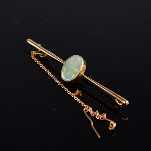 1114 - An early 20th century 9ct gold cabochon opal bar brooch, opal dimensions: length - 11.70mm, width - ... 