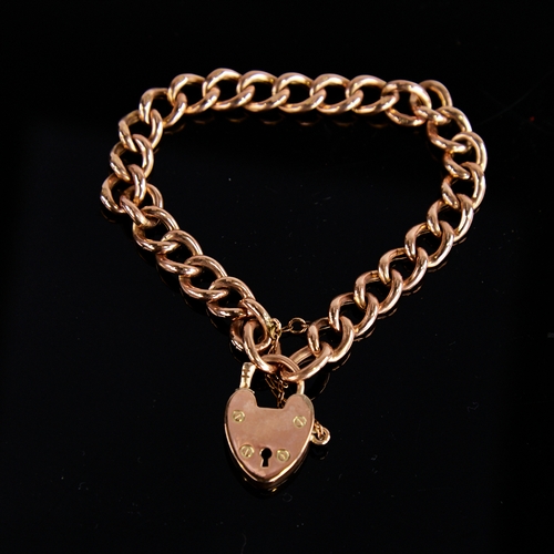 1119 - An early 20th century 9ct rose gold hollow curb link heart padlock charm bracelet, hallmarks Chester... 