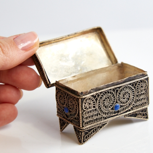 1124 - An unmarked silver Judaica miniature casket, floral wirework decoration set with cabochon garnet tur... 