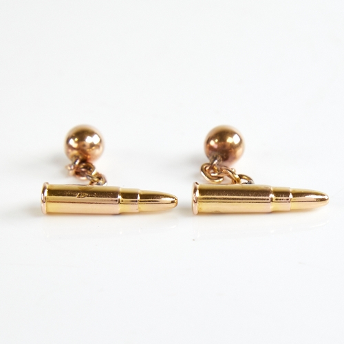 1125 - An early 20th century pair of 9ct gold bullet cufflinks, hallmarks Chester 1902, bullet length 22.6m... 