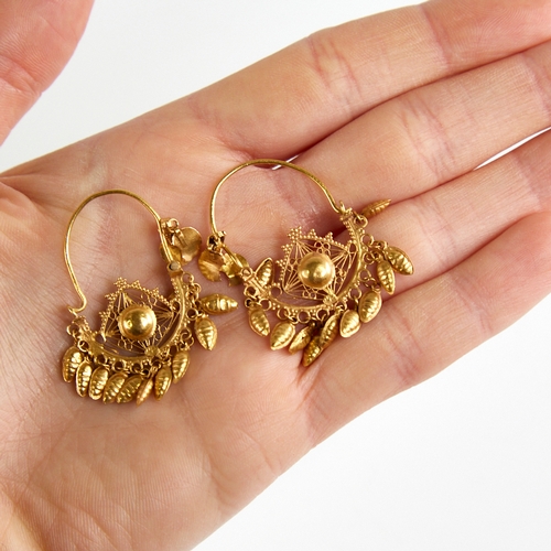 1130 - A pair of Turkish gold crescent hoop earrings, pierced wirework decoration with en tremblant beehive... 