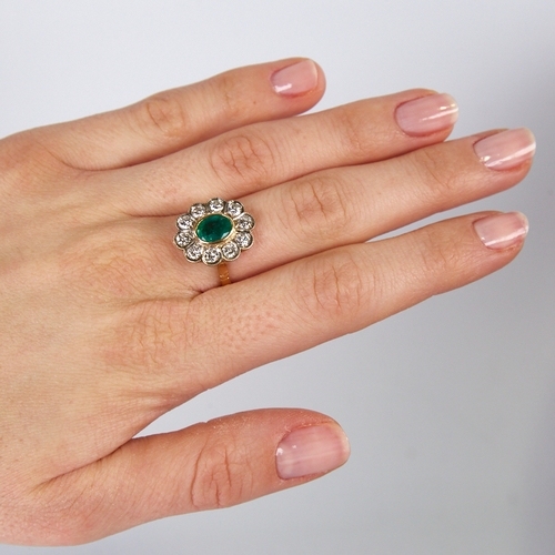 1133 - A Continental unmarked gold emerald and diamond cluster flowerhead ring, total diamond content appro... 