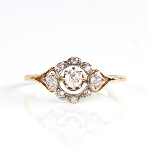 1134 - An early 20th century 18ct gold diamond halo cluster ring, total diamond content approx 0.25ct, sett... 